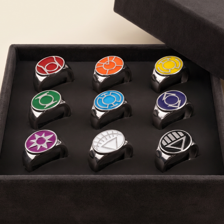 Nine standard Lantern power rings arranged in three rows in a charcoal display box; presentation box not included